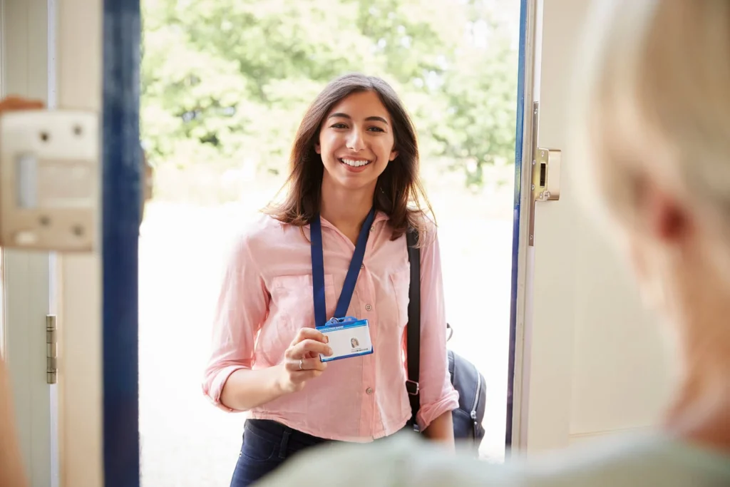 female care worker on home visit showing her id c 2021 08 26 16 13 48 utc 1
